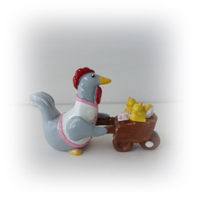 Höna med kycklingar i vagn